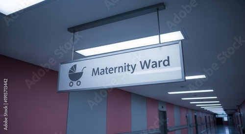 Maternity Ward Sign Displaying Symbol in Hospital Corridor with Subtle Lighting