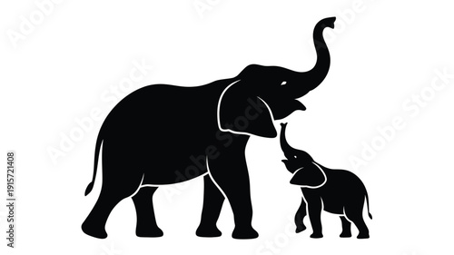 Silhouettes of adult and baby elephant in playful interaction