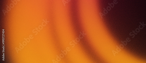 Grainy abstract orange and brassy brown gradient background with noise texture for wide banner design
