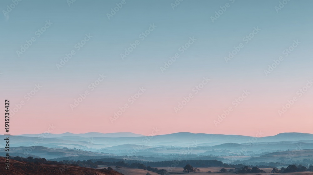 Fototapeta premium Serene Landscape at Dawn with Soft Pastel Skies Over Rolling Hills and Distant Mountains Under Gentle Light of Early Morning