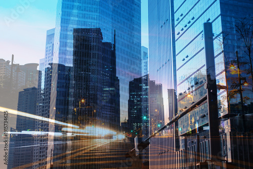 Modern City Double Exposure with Light Trails – Urban Business and Technology Concept