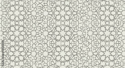Intricate geometric pattern featuring floral motifs and symmetrical designs in a repeating layout viewed from directly above
