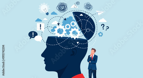 A businessman contemplates complex ideas and technology surrounding a human head silhouette