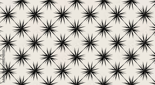 A repeating pattern of black starburst shapes on a neutral background viewed from directly above