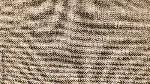 Fabric hand woven linen texture in brown color net background