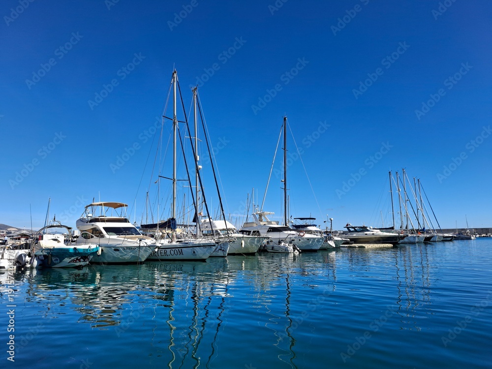 Obraz premium Boats in the harbour of the spanish town Fuengirola on the Costa del Sol