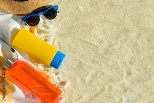 Tableau sur toile Beach Essentials with Hat, Sunglasses, Sunscreen and Water Bottle
