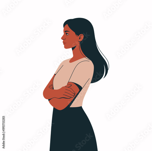 Woman standing sideways with arms crossed demonstrates a feeling of quiet resolve or contemplation.