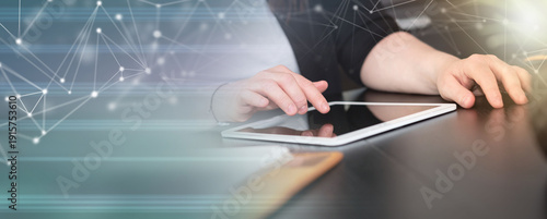 Businesswoman using digital tablet; panoramic banner
