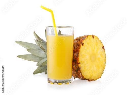 Fresh pineapple juice in a glass and pineapple cut in half isolated on white background. Genuine photo, not generated by AI