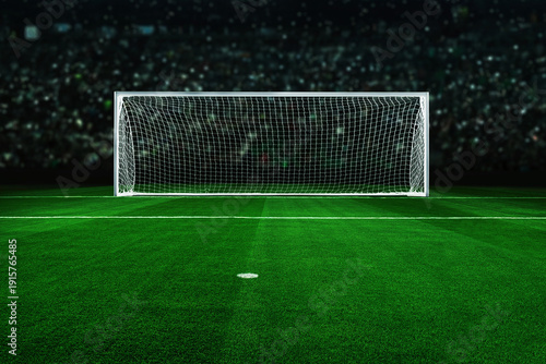Empty soccer goal on a vibrant green field under bright stadium lights. Dramatic night atmosphere with a blurred crowd background, perfect for sports marketing, competition, and goal-setting concepts.