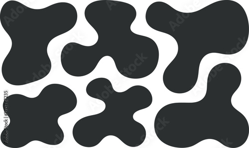 Collection of abstract dark grey shapes on a white background for design and creative projects