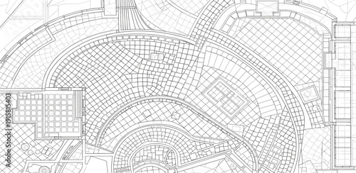 Aerial view of a detailed architectural blueprint of a large circular building complex with grid patterns and pathways