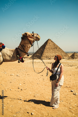 Woman Looking With Care In The Eyes Of A Camel
