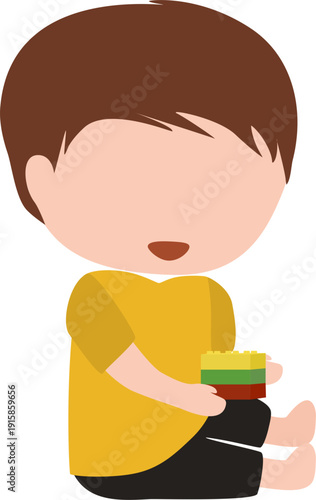 Boy playing with building block