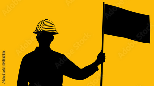 A silhouette of a worker wearing a helmet, holding a flag, set against a golden background