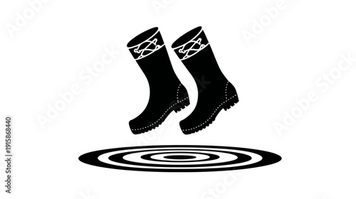 A pair of black boots with white trim and laces is above a ripple circle