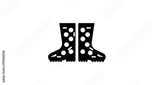 A pair of symmetrical black rain boots with white dots. Rendered on a white background