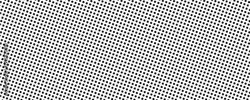 Dotted halftone gradient texture. Fading polka dot background. Repeated dots gradation pattern background. Black vanishing comic pop art overlay backdrop. Halftone raster effect wallpaper.