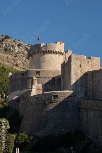 Canvas Print Exterior view of the ancient stone defensive walls in Dubrovnik, impressive medi