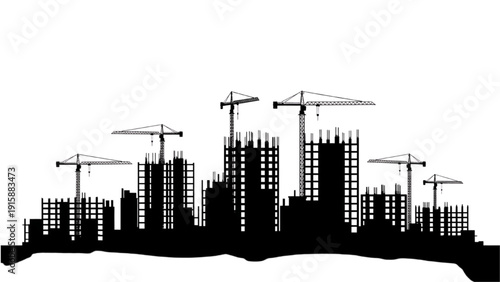 Silhouette of a city skyline under construction with cranes