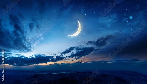 A Crescent Moon Shining Brightly Amidst Dark Clouds In A Deep Blue Night Sky Above The Horizon