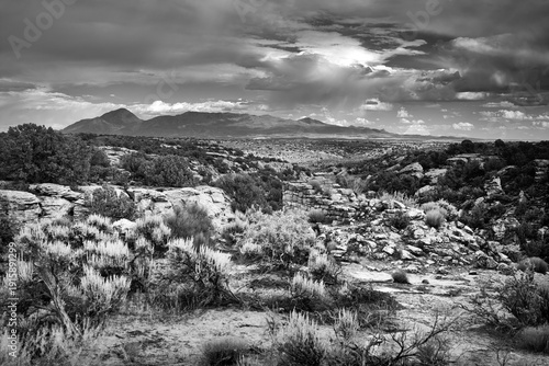Black and White Ancestral Puebloan Stone Ruins in Desert Landscape