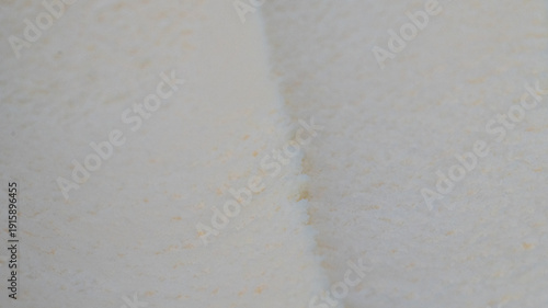 Wallpaper Mural Vanilla ice cream texture background in close-up Smooth creamy frozen dessert surface with subtle details. Torontodigital.ca