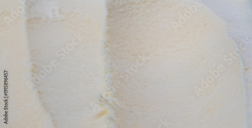 Wallpaper Mural Vanilla ice cream texture background in close-up Smooth creamy frozen dessert surface with subtle details. Torontodigital.ca