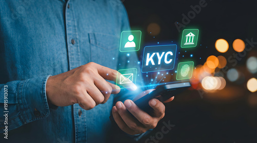 Man in blue shirt using smartphone with know your customer icons floating above screen at night