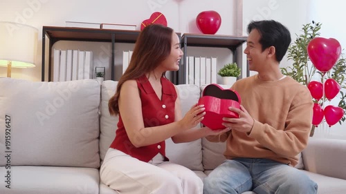 Wallpaper Mural Romantic asian woman hiding heart gift box to surprise boyfriend, celebrating Valentine's Day or anniversary, young couple in love with joyful expectation and exciting feeling, romantic event. Torontodigital.ca