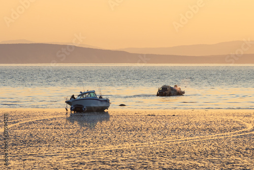 Obraz na plátně Boat on the shallows at low tide