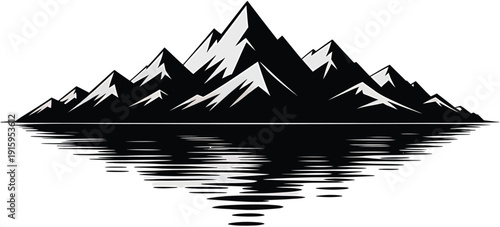 Monochromatic mountain range peaks reflected in water creating ripple effect alpine landscape