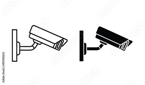 Two security cameras in black and white with one being black and the other white mounted on a wall bracket