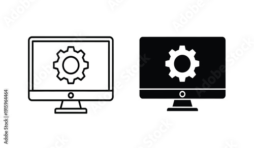 Two computer monitors with gear icons on screens in black and white