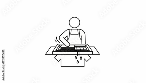 Artisan making paper by hand, pouring pulp into a mold and deckle frame