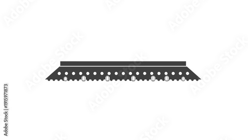 Close up of metal perforated strip.