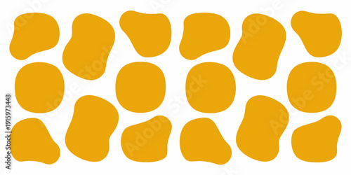 Abstract arrangement of irregular overlapping golden yellow shapes on white