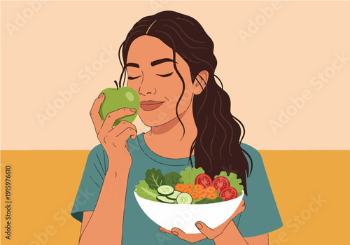 A woman with dark hair smelling a fresh green apple while holding a bowl of healthy salad, promoting a nutritious lifestyle.