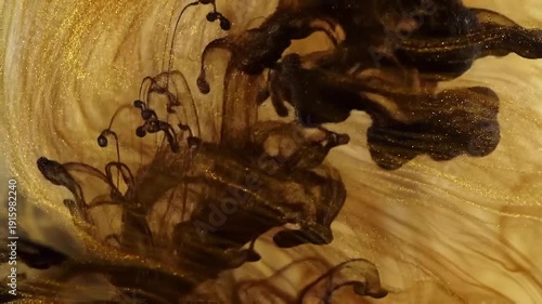 Coffee Pouring into Swirling Cream Closeup.