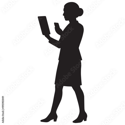 Silhouette of a professional woman reviewing documents on a tablet and phone