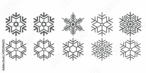 Collection of detailed black and white snowflake illustrations in a grid layout