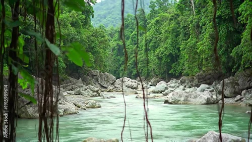 Serene River Flowing Through Rocky Landscape.