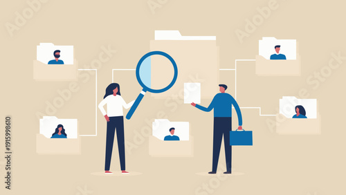 Two professionals examine a network of files and profiles searching for relevant data