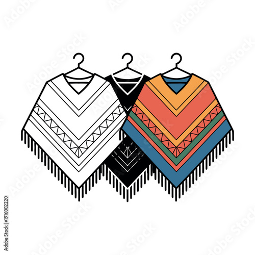 Three colorful woven ponchos hang on black wire hangers against a white background.