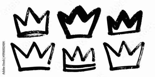 A set of three hand drawn crowns sketched in black ink on a white background