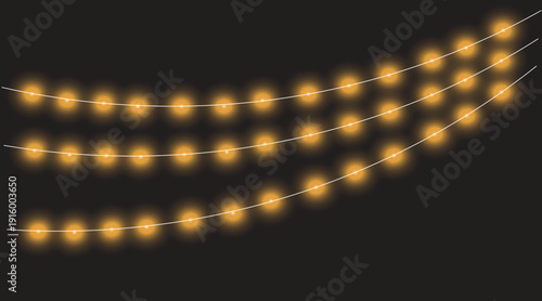 Mesmerizing light effect glowing string of yellow lights on black background