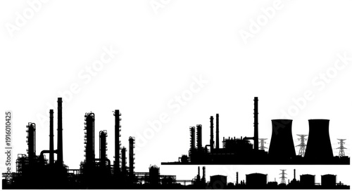 Silhouette of an industrial oil refinery complex at night.