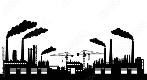 Silhouette of industrial factory buildings with smoking chimneys and cranes.