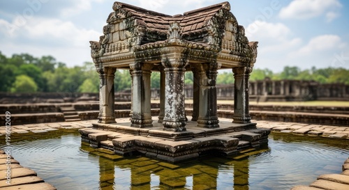 Ornate stone structure on water, classical columns, ancient architecture, sunny day setting